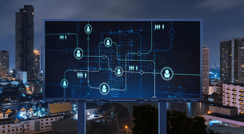 City billboard displaying connected nodes depicting private use of a public blockchain