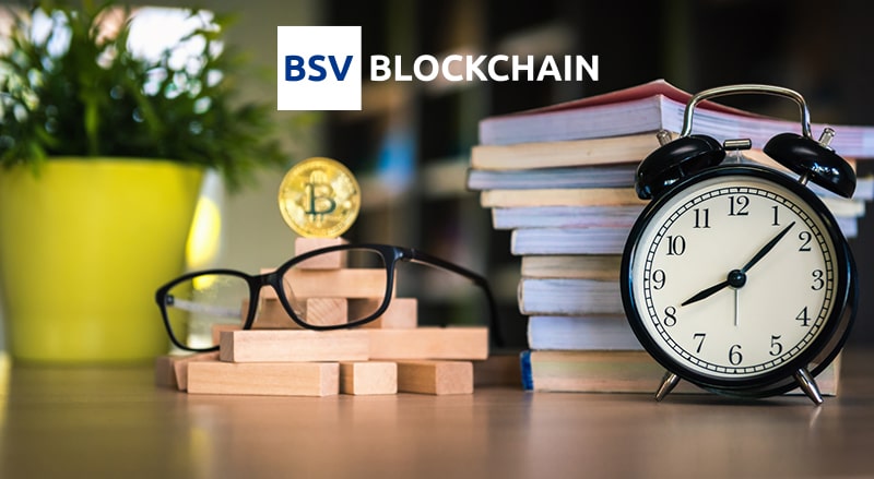 BSV Blockchain logo over stack of books, clock, glasses, and Bitcoin representing Blockchain education