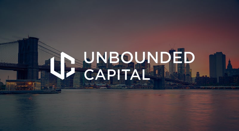 Unbounded Capital Logo over New York coastline for the Unbounded Capital Summit in New York