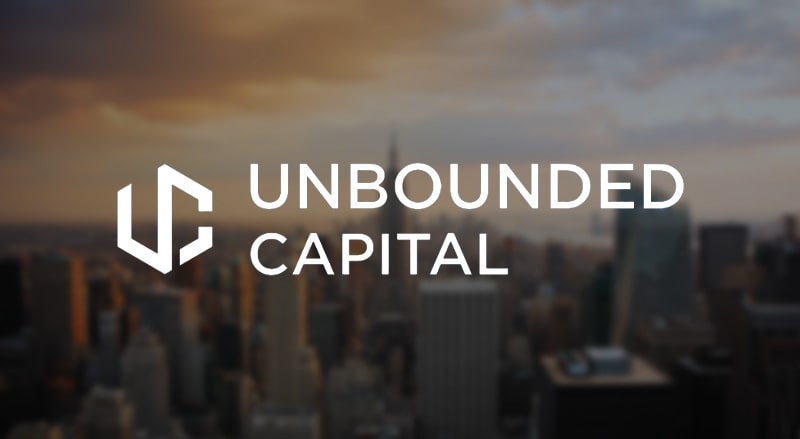 Unbounded Capital logo over New York Skyline for the first annual Unbounded Capital Summit