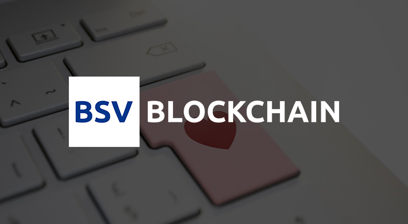 BSV Blockchain over keyboard with heart key symbolizing online dating